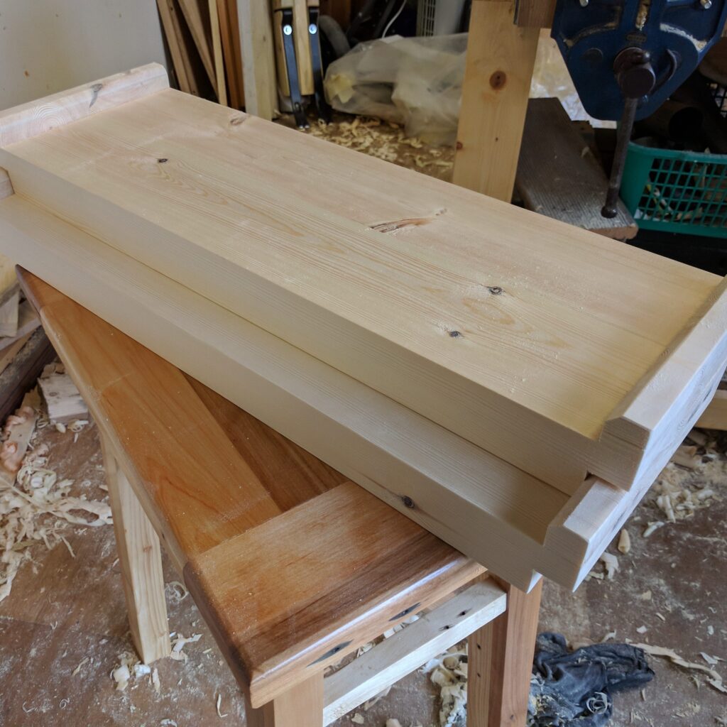 Two deadlift blocks made from construction timber