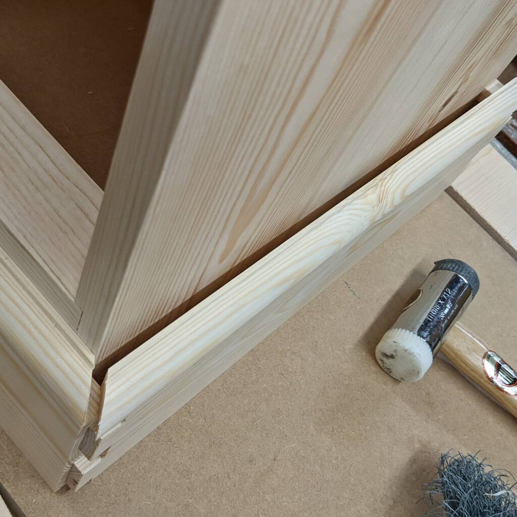 Fitting the half blind mitred dovetailed skirts
