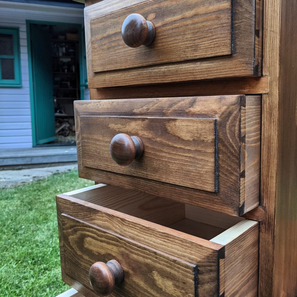 Finished set of drawers with drawers open